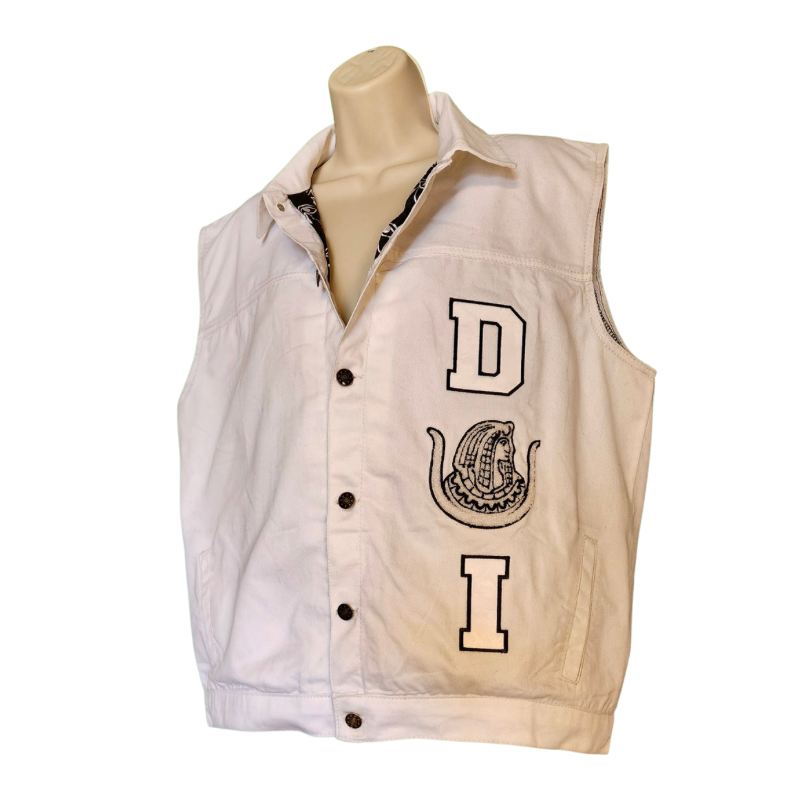 Front view of custom Daughters of Isis white denim vest with chenille emblem and tackle-twill letters